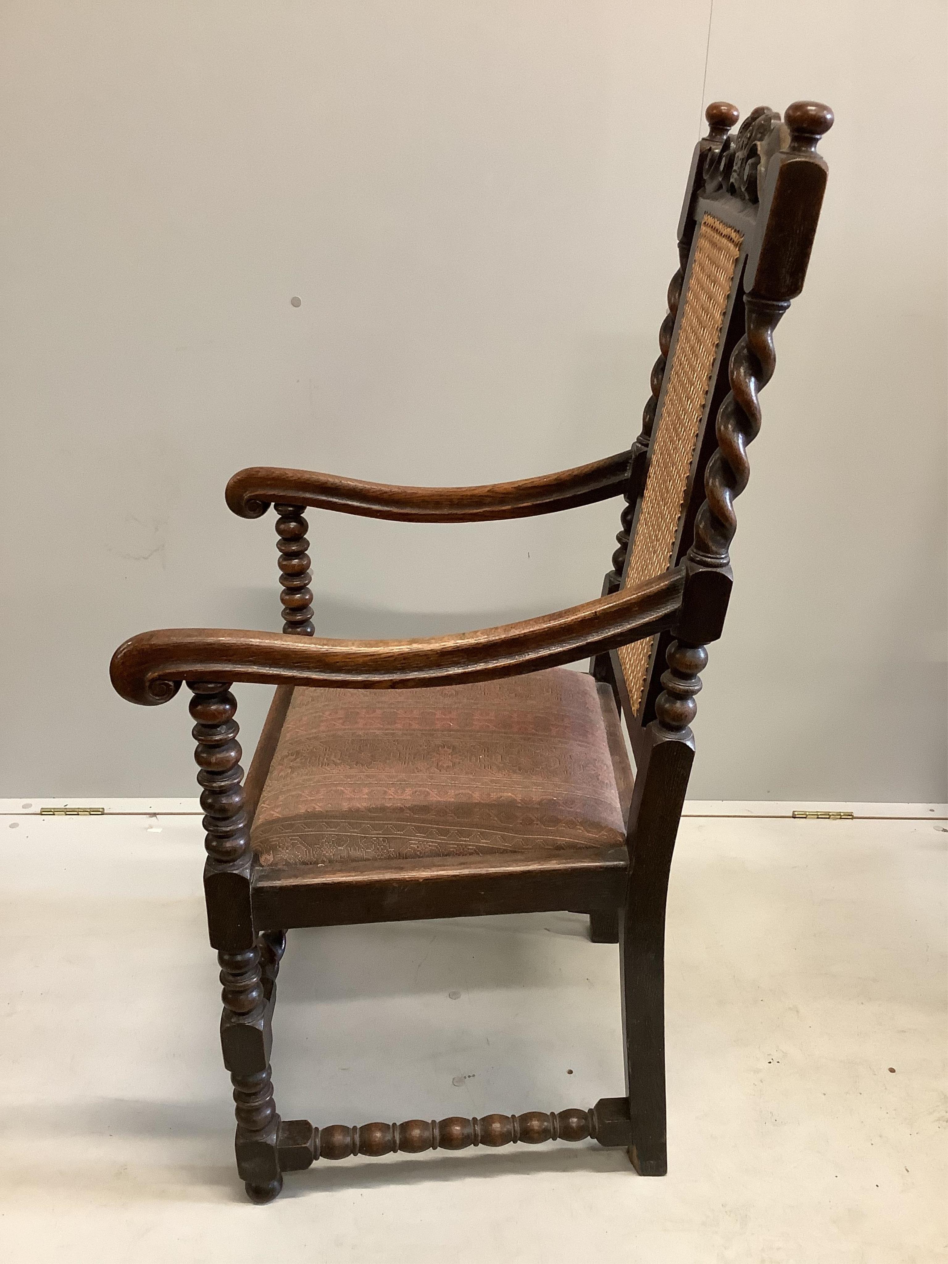 A set of eight late 19th century Carolean style carved oak caned back dining chairs, (six single, two arms). Condition - fair
